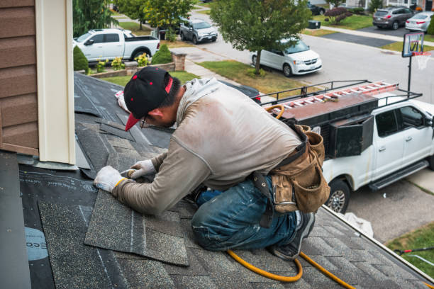 Professional Metal Roofing technician working in Saint James, NY